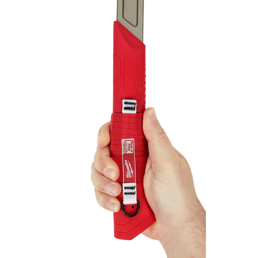 Hand holding a red tool with a white background