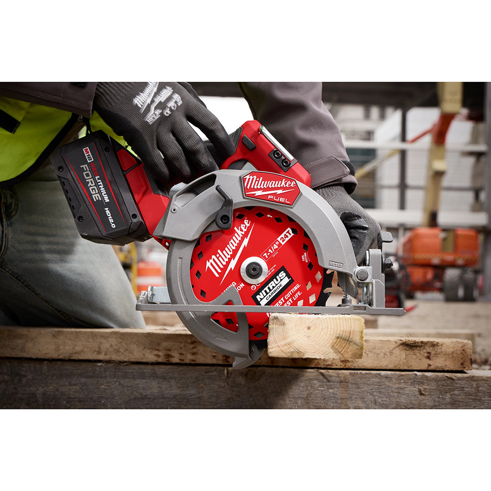 Milwaukee circular saw in use on a wooden plank with a blurred construction site background