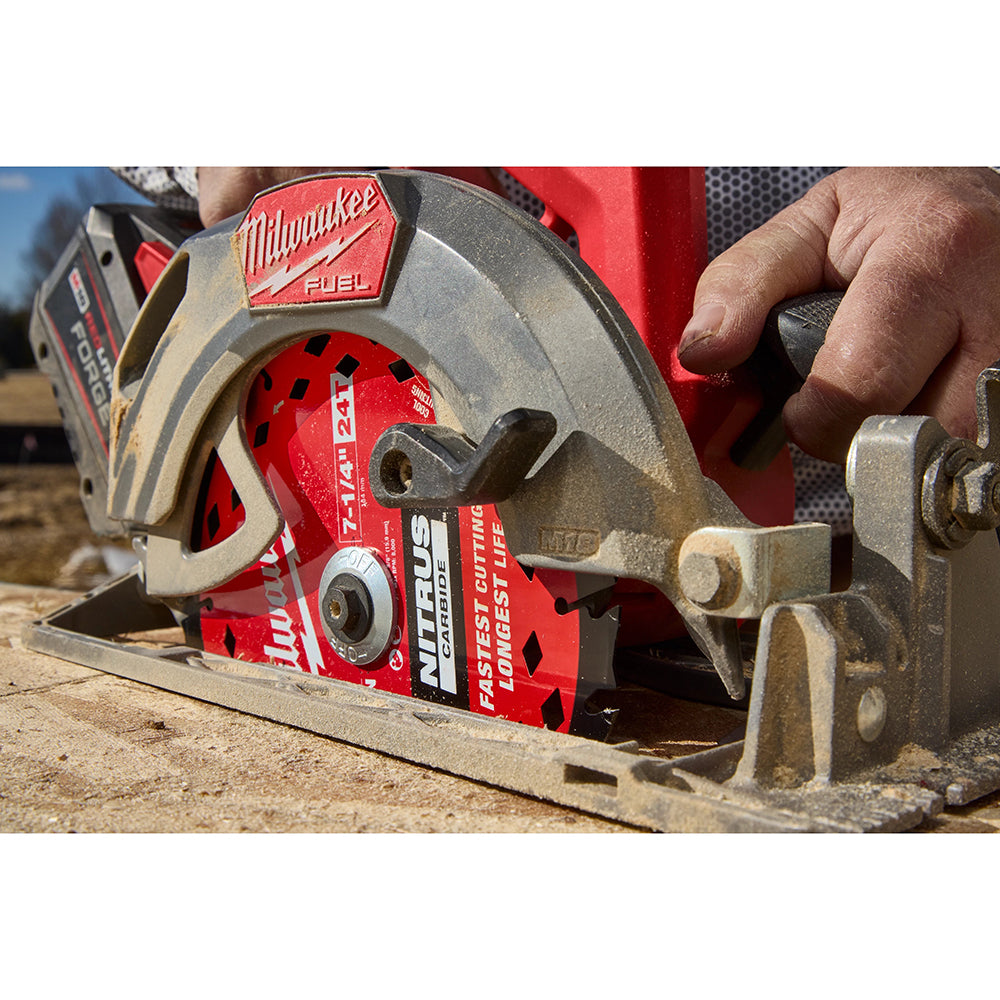Milwaukee circular saw cutting through wood with a clear background