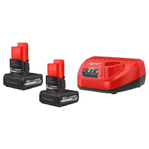Two red and black Milwaukee batteries with a charger on a white background