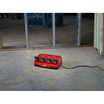 M12™ 4-Bay Sequential Charger charging batteries on the jobsite