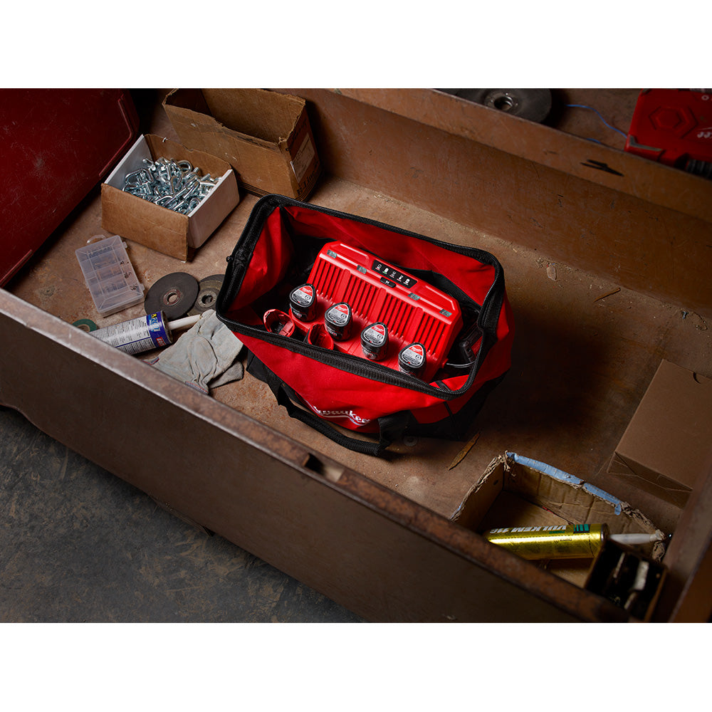 M12™ 4-Bay Sequential Charger charging batteries on the jobsite