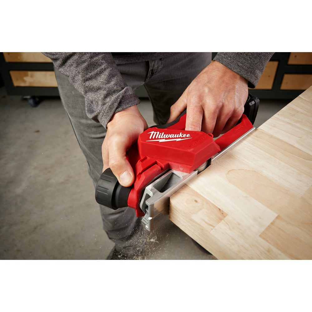 Person using M12™ Brushless 2" Planer on the jobsite