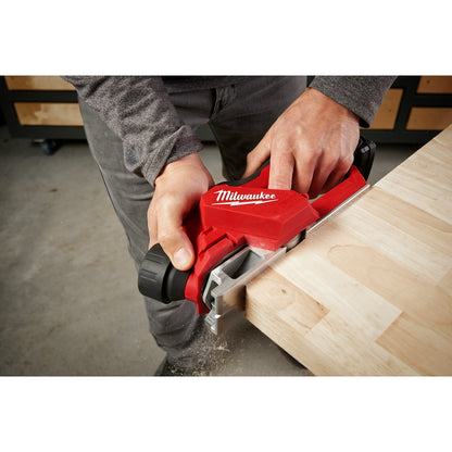 Person using M12™ Brushless 2" Planer on the jobsite