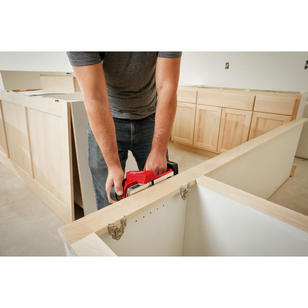 Person using M12™ Brushless 2" Planer on the jobsite