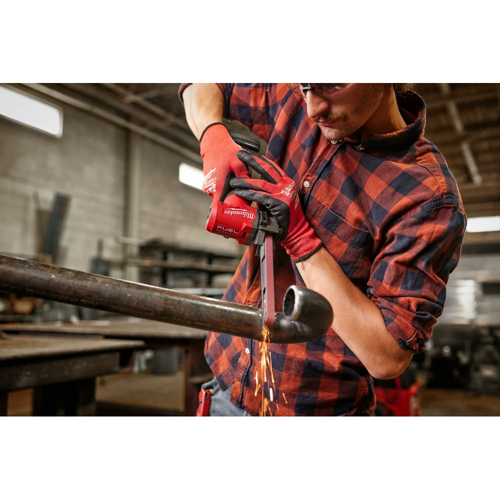 Person using M12 FUEL™ 1/2" X 18" Bandfile on the jobsite