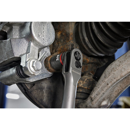 Person working on a car engine with M12 FUEL™ INSIDER™ Extended Reach Box Ratchet. 