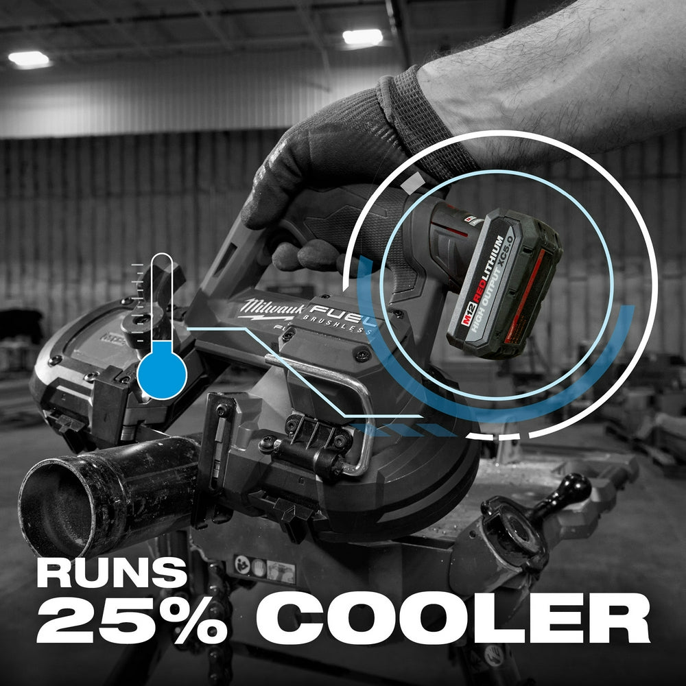 Close-up of a Band Tool with M12™ REDLITHIUM™ HIGH OUTPUT™ XC5.0 Battery Pack and pipe with a hand holding it.