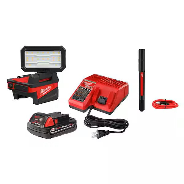 Milwaukee tool kit with flashlight, charger, battery, and pen on a white background