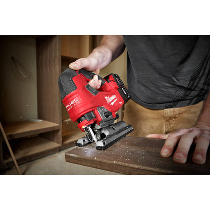 Person using a M18 FUEL™ D-handle Jig Saw on a wooden surface
