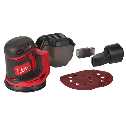 Milwaukee M18 random orbit sander with a red and black color scheme, including a dust canister, universal hose adapter, and two pieces of 80 grit sandpaper.