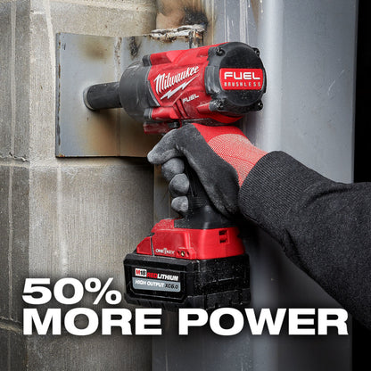 Person using a Milwaukee power tool and battery on a metal surface. 50% More Power