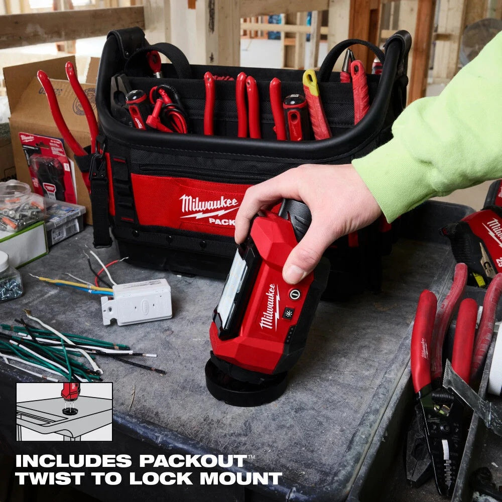 Person using a Milwaukee tool with a tool chest in the background