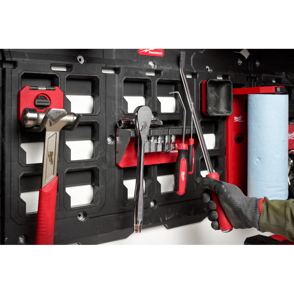 Tool organizer with various tools in a garage setting